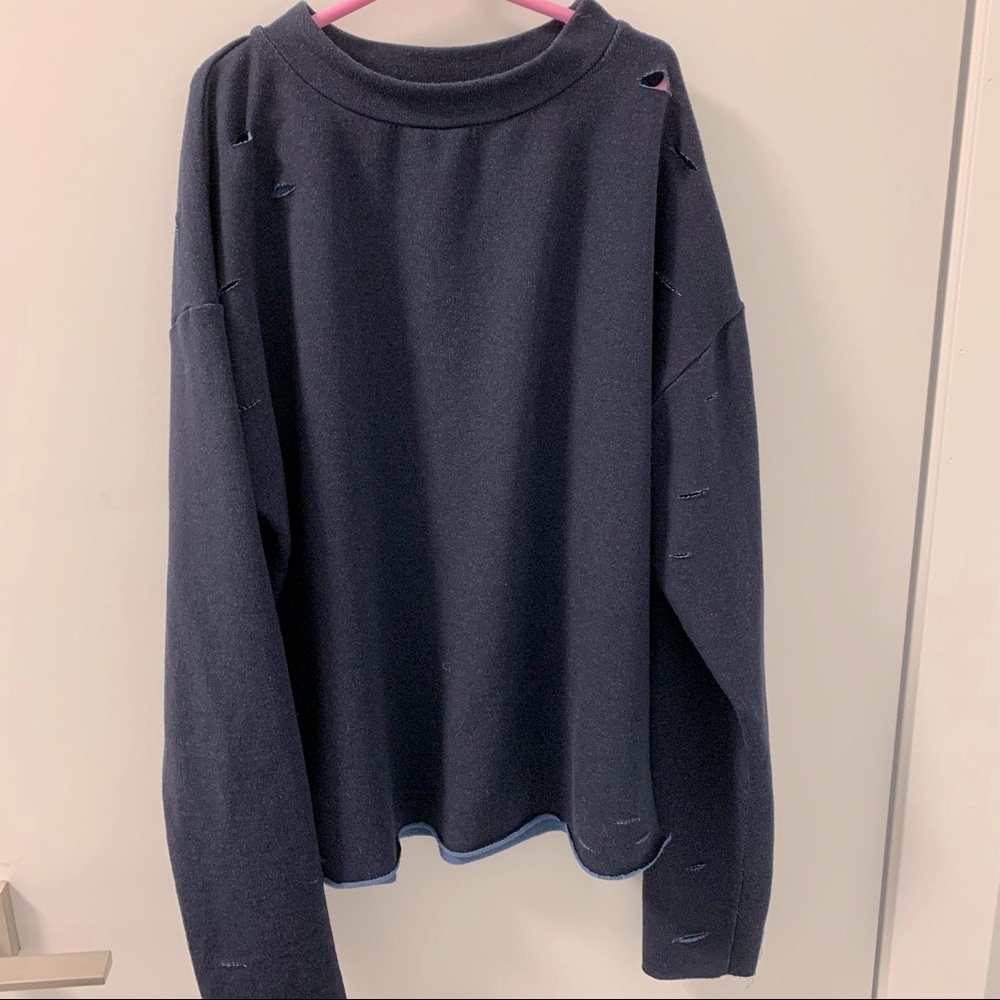 Navy blue sweatshirt with rips